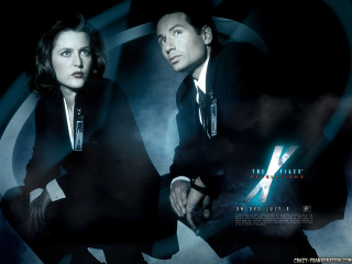 Man woman suits sitting dark - a man and a woman free wallpaper