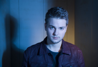 Man leather jacket serious look 7 - his face and shoulders free wallpaper for desktop