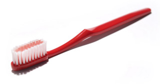 Red toothbrush white bristles white - a white background free wallpaper