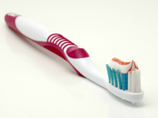 Toothbrush toothpaste tabletop next to - a table top next free wallpaper
