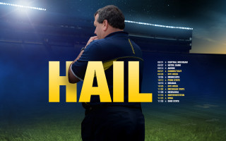 Man standing stadium hail background - brad holland free wallpaper