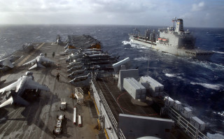 Large ship ocean background smaller 3 - a smaller ship in the background free wallpaper