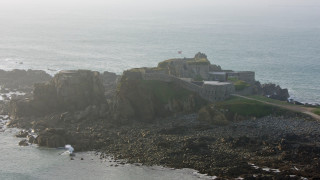 Castle rocky cliff ocean shore - a rocky cliff free wallpaper