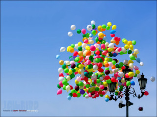 Balloons floating above street light - a bunch of balloons free wallpaper