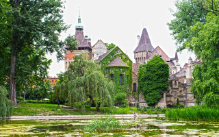 Castle pond trees people walking - medieval free wallpaper