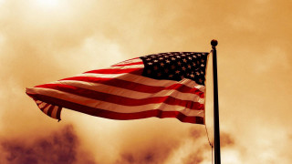 Flag flying cloudy sky sunbeam 2 - a sunbeam in the background free wallpaper