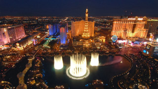 City fountain night lights water - a fountain in the middle of it free wallpaper