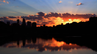 Sunset city lake clouds sky 2 - crepuscular ray free wallpaper