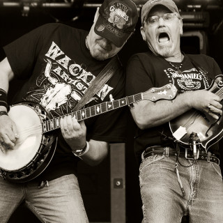 Two men playing musical instrument - free motorcycles wallpaper for tablet