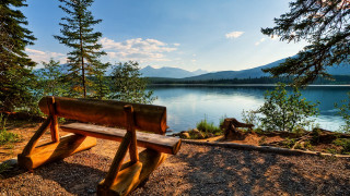 Bench lake mountains blue sky 3 - the shore of a lake free wallpaper