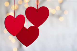 Red hearts hanging strings lights - a boke of lights free wallpaper