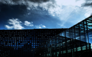 Building sky clouds cityscape night - a sky background and a building free wallpaper