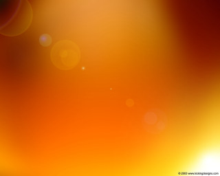 Blurry orange yellow sunburst lightbulb - constant permeke free wallpaper