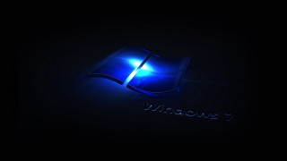 Blue windows logo black background - the middle of the image free wallpaper