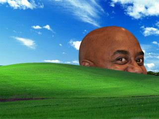 Man peeking green hill blue - surrealism free wallpaper