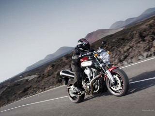 Man motorcycle road mountain range - a man riding free wallpaper for desktop