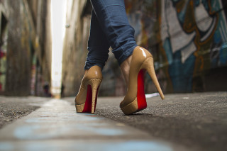 Woman legs shoes city street - low angle free wallpaper