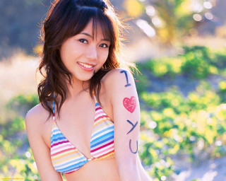 Woman tattoo bikini top shorts - her arm and chest free wallpaper