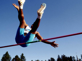 Woman high jump pole shoes - her foot free wallpaper