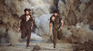 Men running dust smoke plume - the ground behind them free wallpaper for desktop