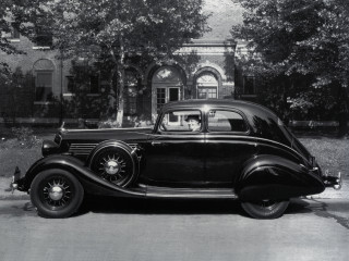 Black white car parked building 2 - photo of a car free wallpaper