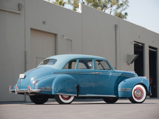 Blue car parked building garage - don eddy free wallpaper