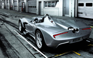 Silver sports car parking lot 11 - a garage door open free wallpaper