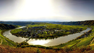River lush green valley hillside 2 - a town free wallpaper
