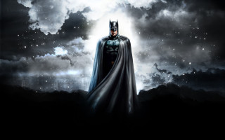 Man batman costume clouds full - a city in the distance free wallpaper