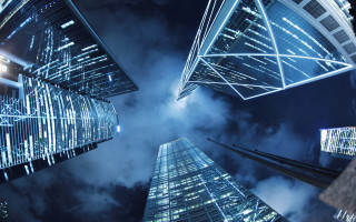 Skyscrapers nighttime sky background clouds - adrian zingg free wallpaper