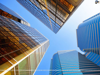 Tall buildings city blue sky - window free wallpaper
