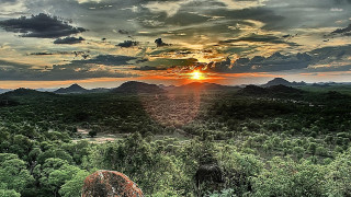 Sunset forest mountain range large - a mountain range in the background free wallpaper for desktop