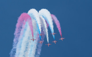 Four airplanes flying formation colored - formation in the sky free wallpaper