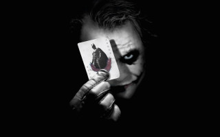 Man holding joker card painted - a card free wallpaper