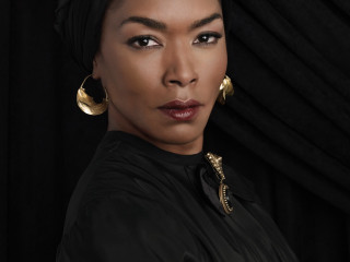 Woman black shirt gold earrings 2 - a black curtain free wallpaper