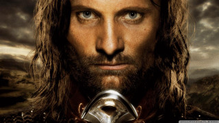 Lord of the rings man - a sword and a helmet free wallpaper