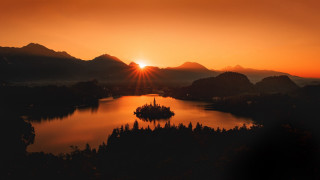 Sunset lake island mountains cinematic - a small island in the middle of it free wallpaper