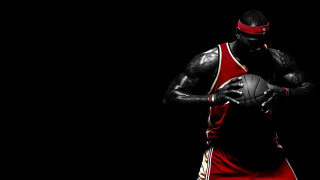 Man holding basketball red uniform 2 - a red uniform free wallpaper for desktop