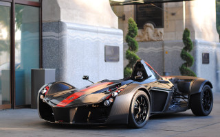 Black red sportscar glassdoor mountain - the side of a street next free wallpaper