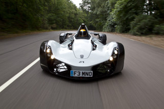 White racecar driving forest road - a license plate free wallpaper for desktop