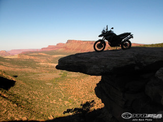 Motorcycle cliff valley mountains blue - a blue sky above free wallpaper