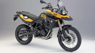 Yellow black motorcycle parked gray - cafer bater free wallpaper