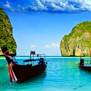 Two boats water rock formation - free beach wallpaper for tablet