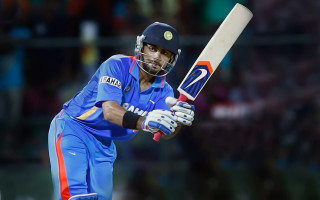 Man blue uniform holding bat - jayison devadas free wallpaper