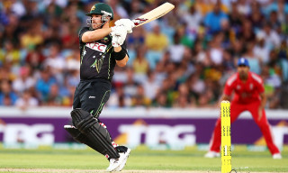 Man black uniform swinging bat - a bat free wallpaper