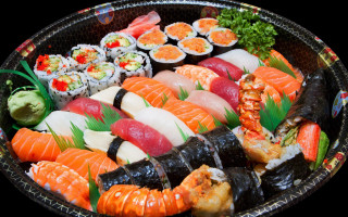 Sushi food items table black - a plate of sushi free wallpaper