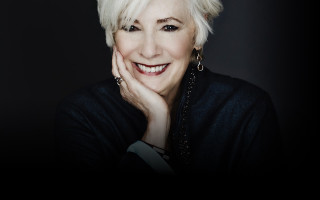 Blonde woman smiling black shirt - carol bove free wallpaper