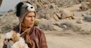 Man dog hat scarf desert - movie scene free wallpaper