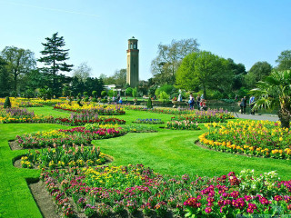 Garden clocktower people walking distance - a green lawn free wallpaper