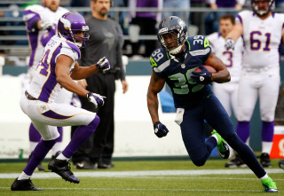 Football player running ball player - a football player running free wallpaper